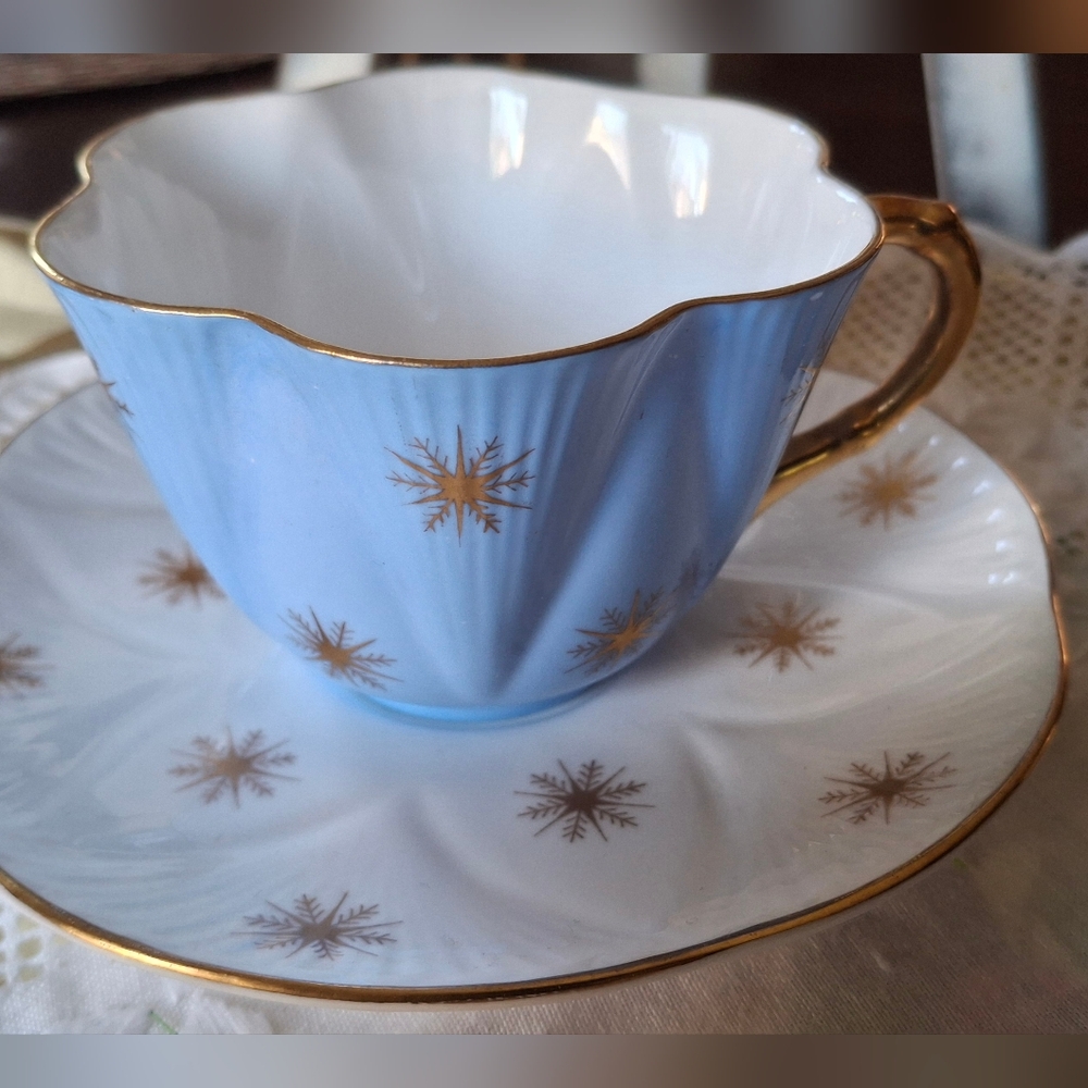 VINTAGE Shelley Dainty Starburst Elegant Blue and White Teacup with Gold Accents